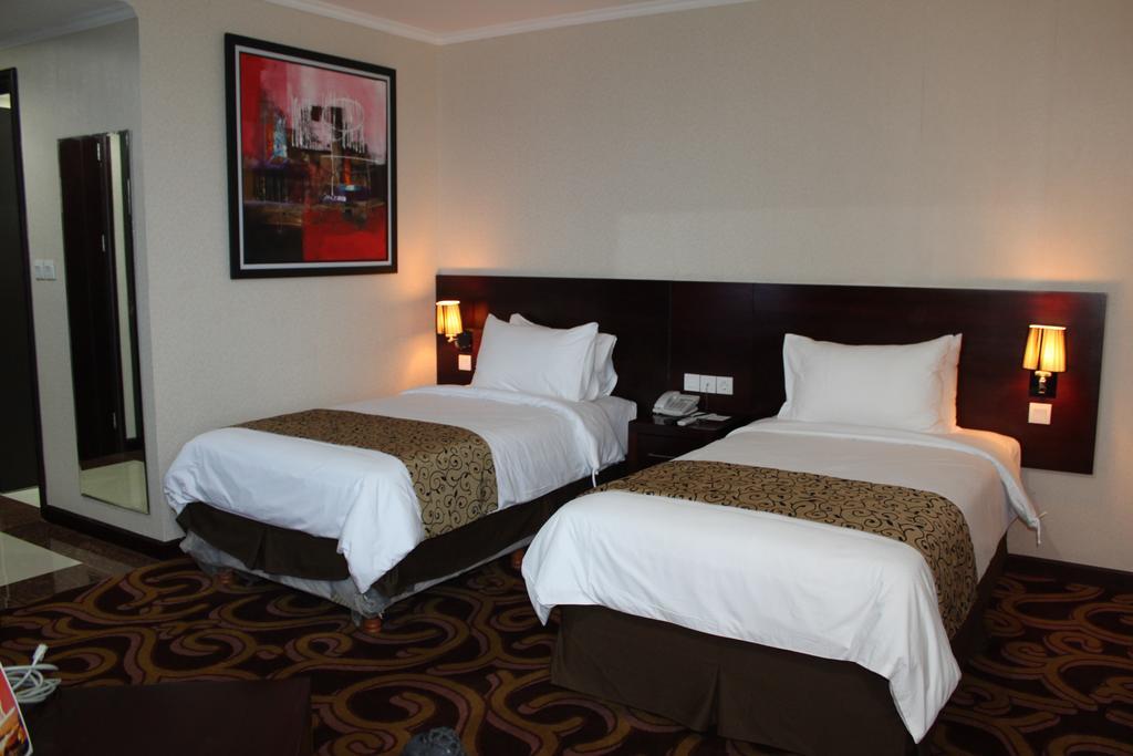 Swiss-Belhotel Merauke Quarto foto